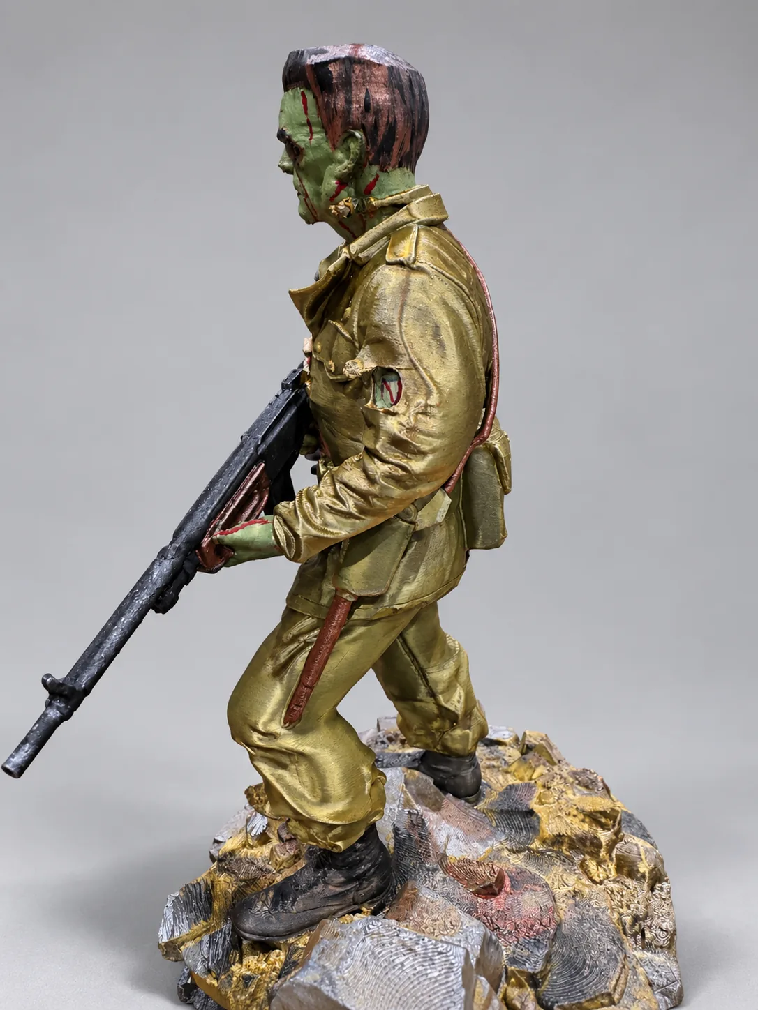Opposite side view of the figure and rifle